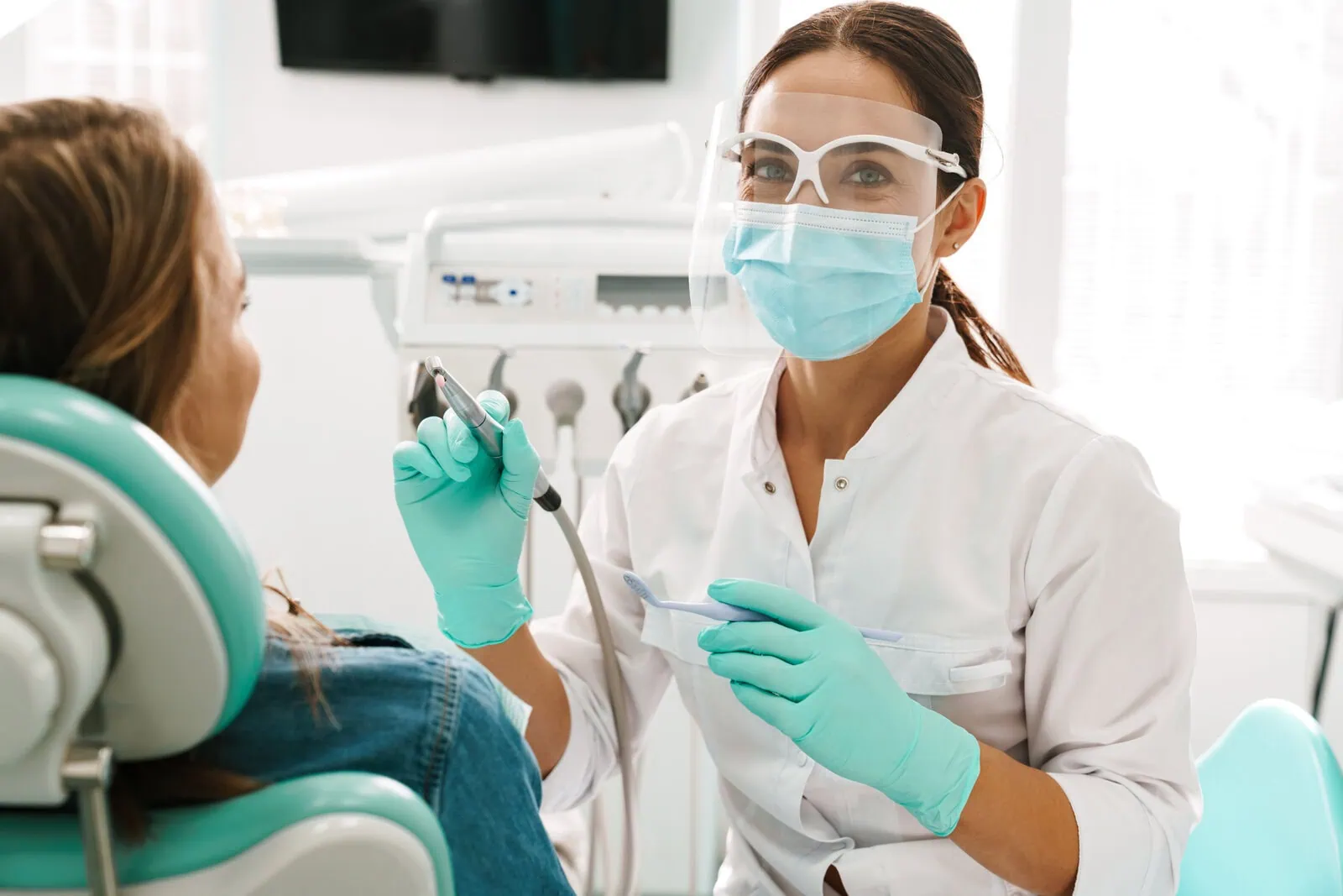 Dr. Oliver Austria providing expert dental care